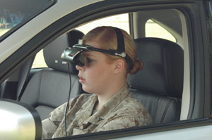 Marine behind the wheel of the Driving Simulator - goggles (HMD) head shot